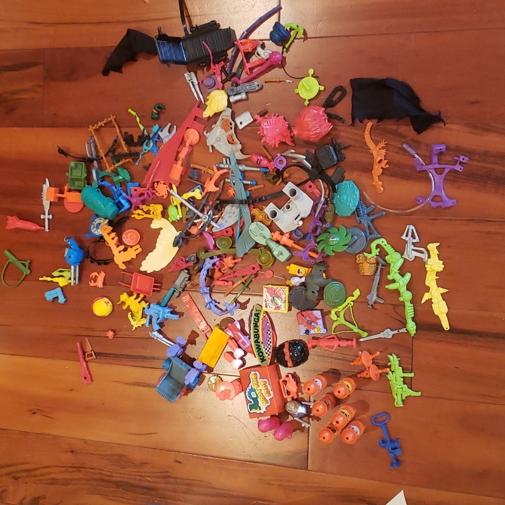 Vintage lot of ninja turtle toy parts toy parts